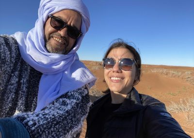 Happy tourists in the desert of Morocco